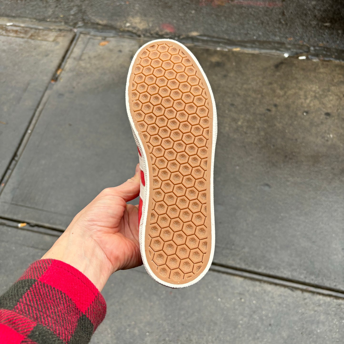 view of gum rubber sole on suede skate sneaker