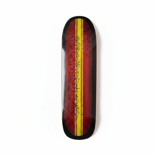 Skateboard deck with a red and yellow design on a white surface