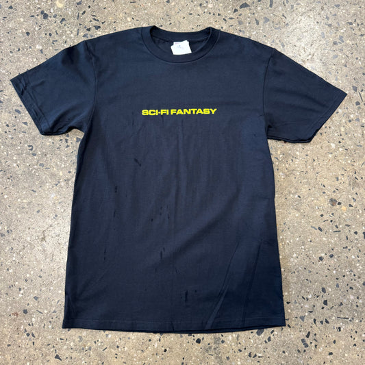 black t-shirt with "sci-fi fantasy" in yellow text across the center