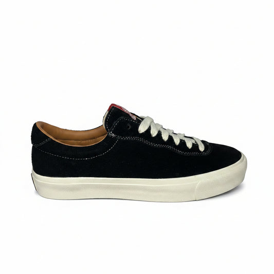 Black sneaker with white laces on a white background