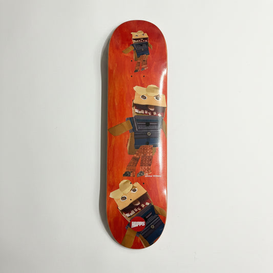 Skateboard deck with a cartoon character design on a white surface