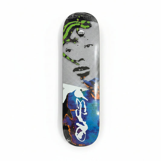 Skateboard deck with artistic design on a white surface