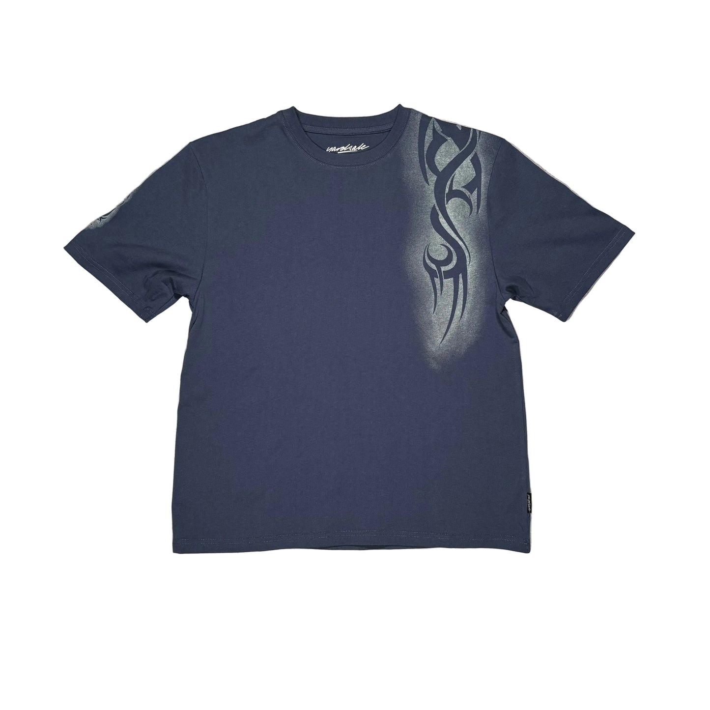 Navy blue t-shirt with tribal design on a white surface
