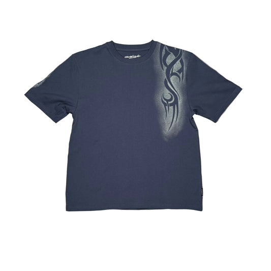 Navy blue t-shirt with tribal design on a white surface