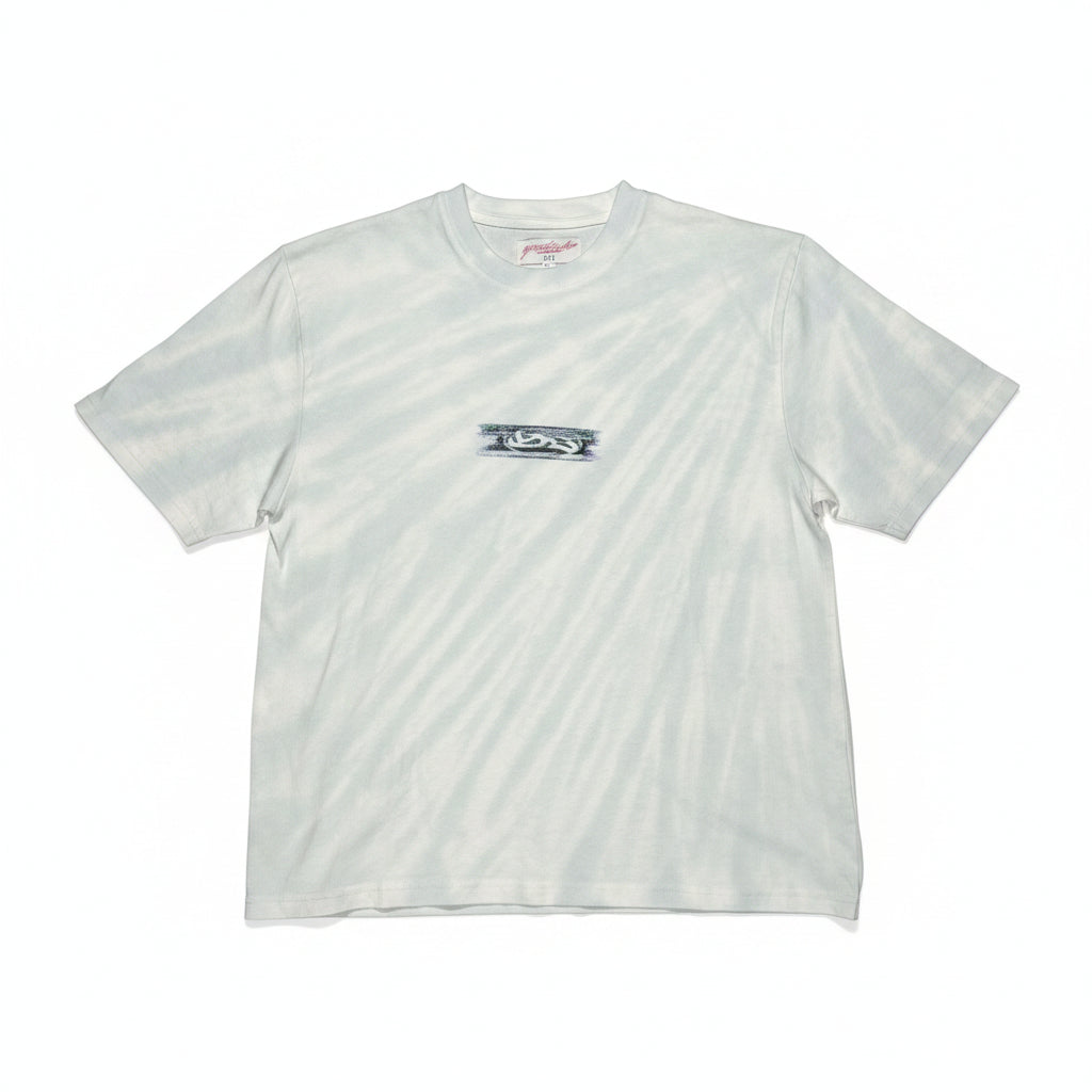 White t-shirt with light tie dye pattern and  a center chest logo on a white surface