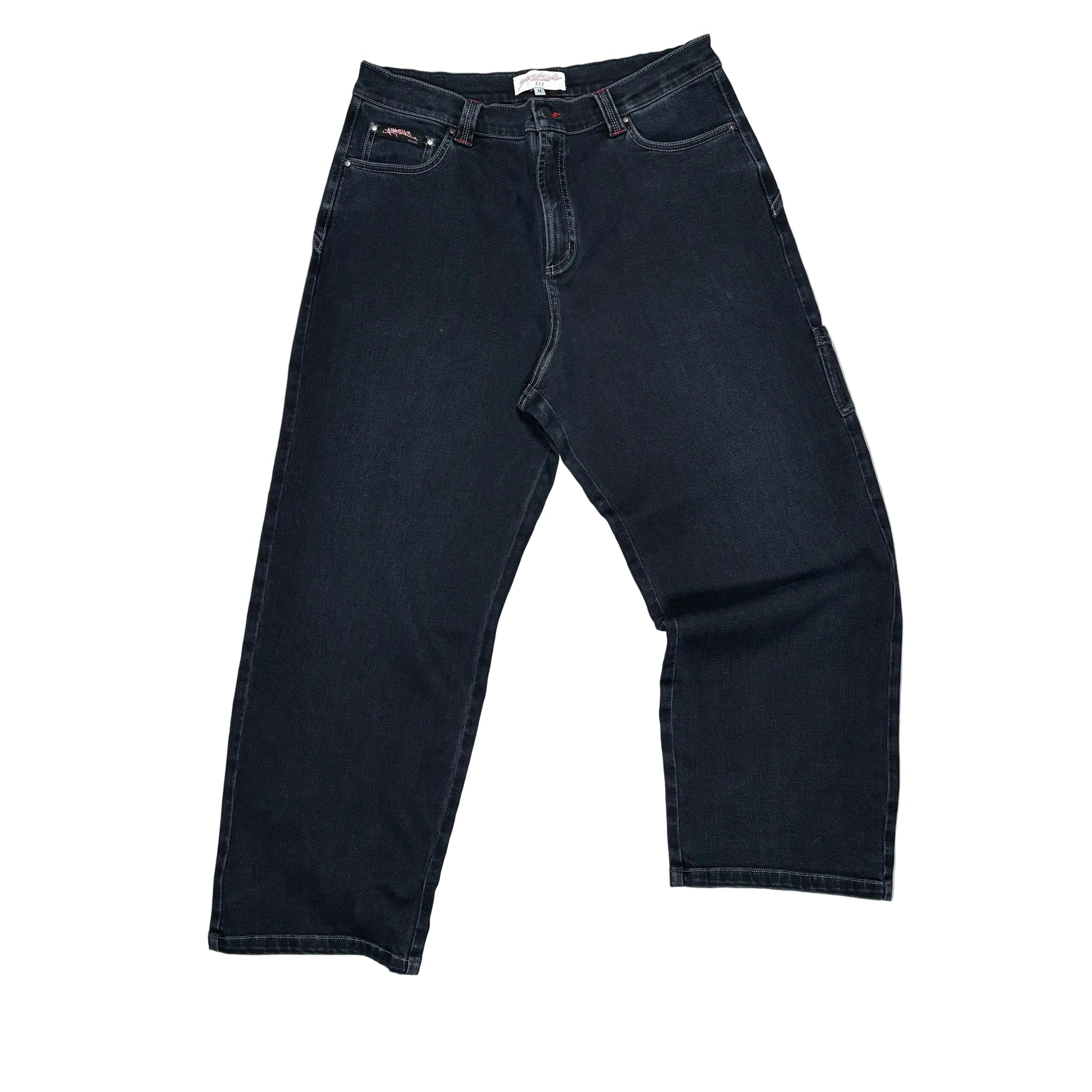 Blue jeans on a white surface 