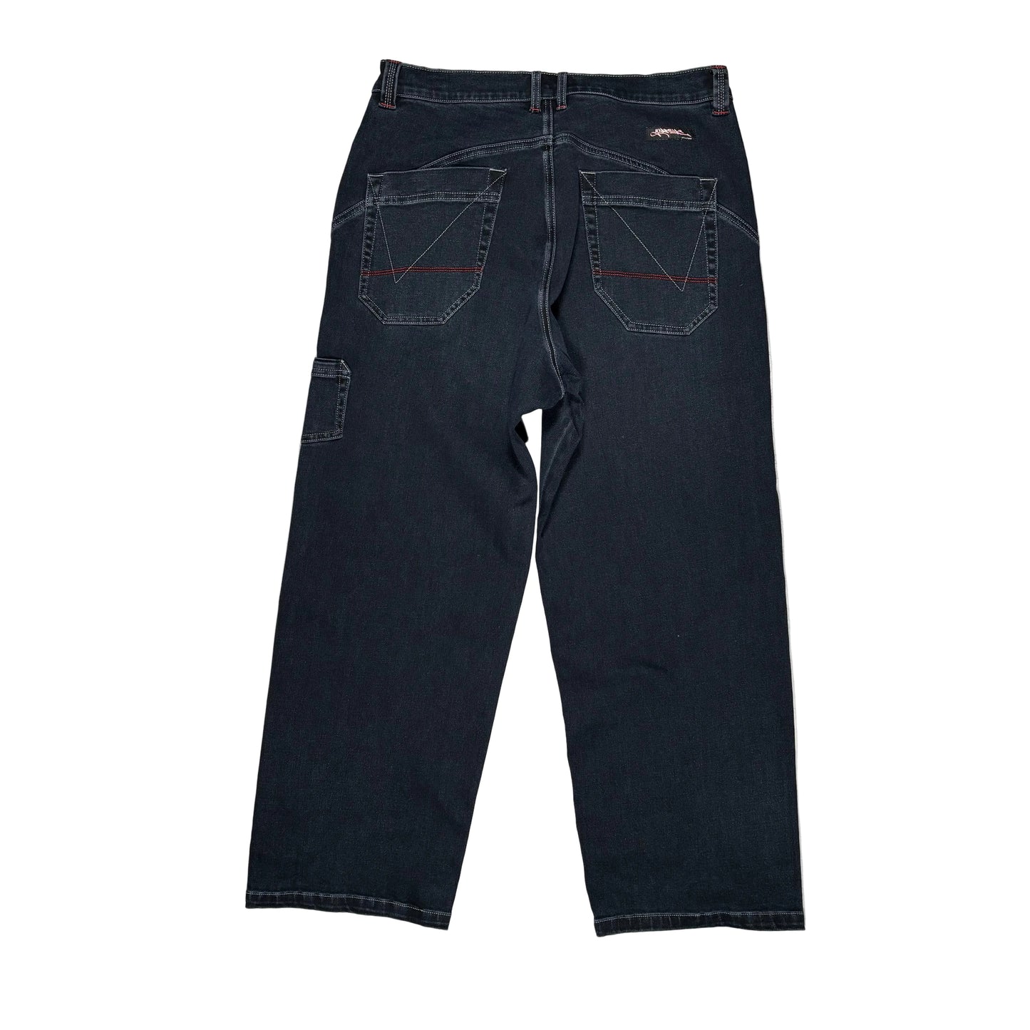 Pair of dark blue jeans on a white surface 