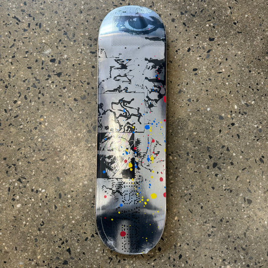 metallic silver skateboard deck with abstract images 