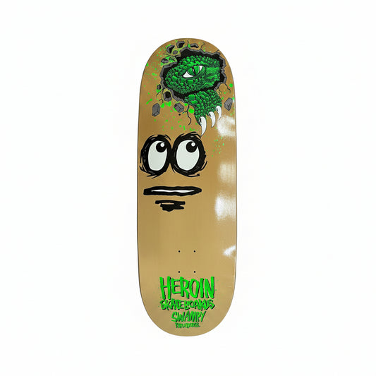 large egg shaped skateboard deck with dinosaur ripping through the graphic