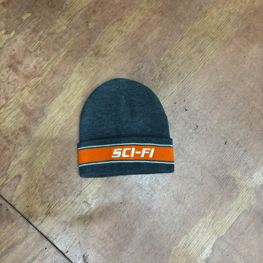 grey and orange folded beanie with SCI FI on fold