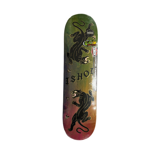 Skateboard deck with a black panther design and 'ISHOD' branding on a gray surface.