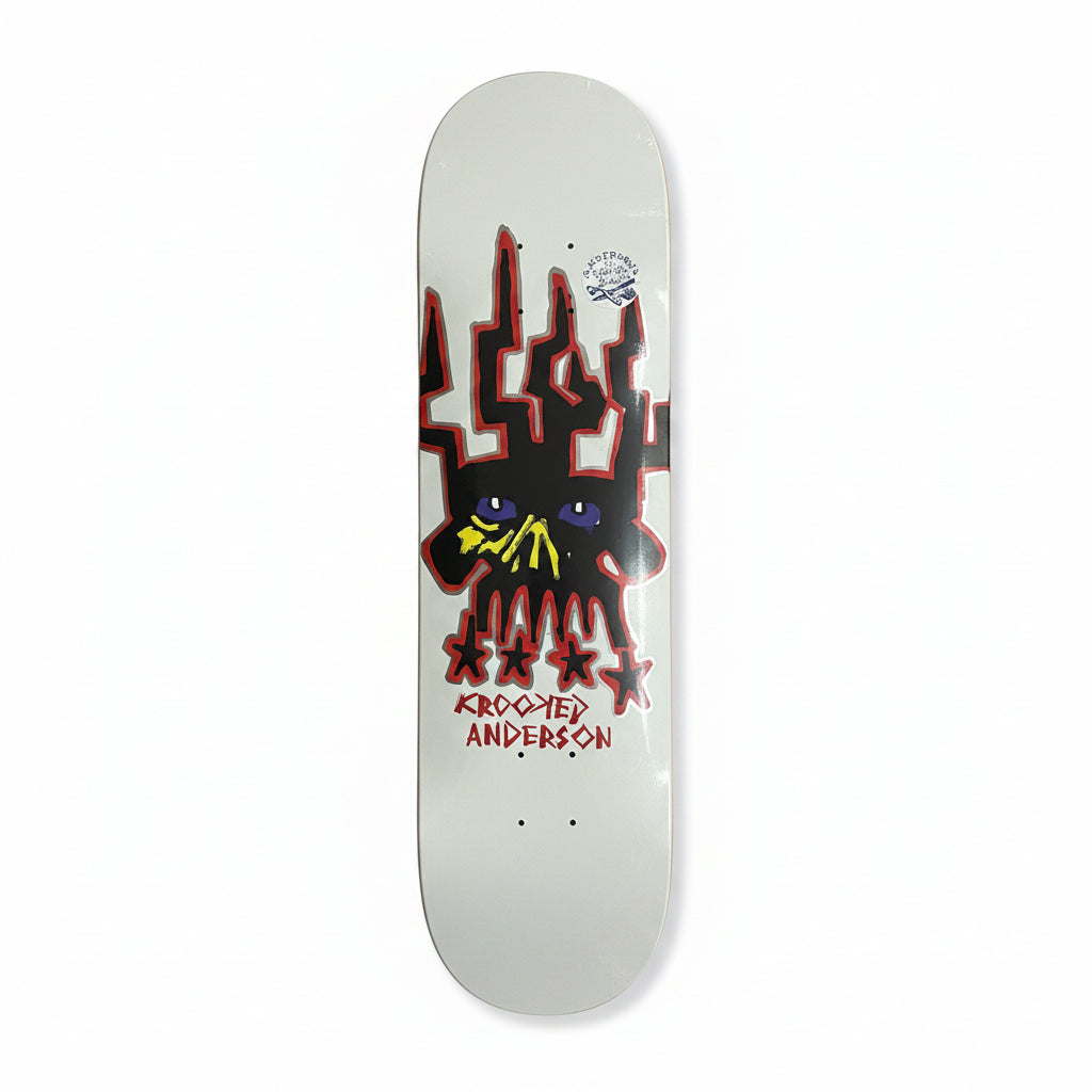 Skateboard deck with a black and red graphic design on a white surface