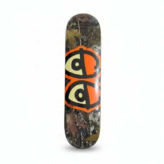 Skateboard deck with a colorful design on a white surface