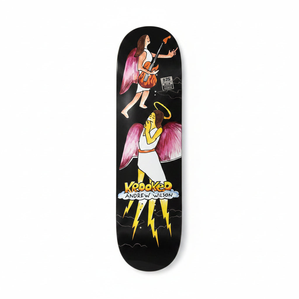 Skateboard deck with artistic design on a white surface