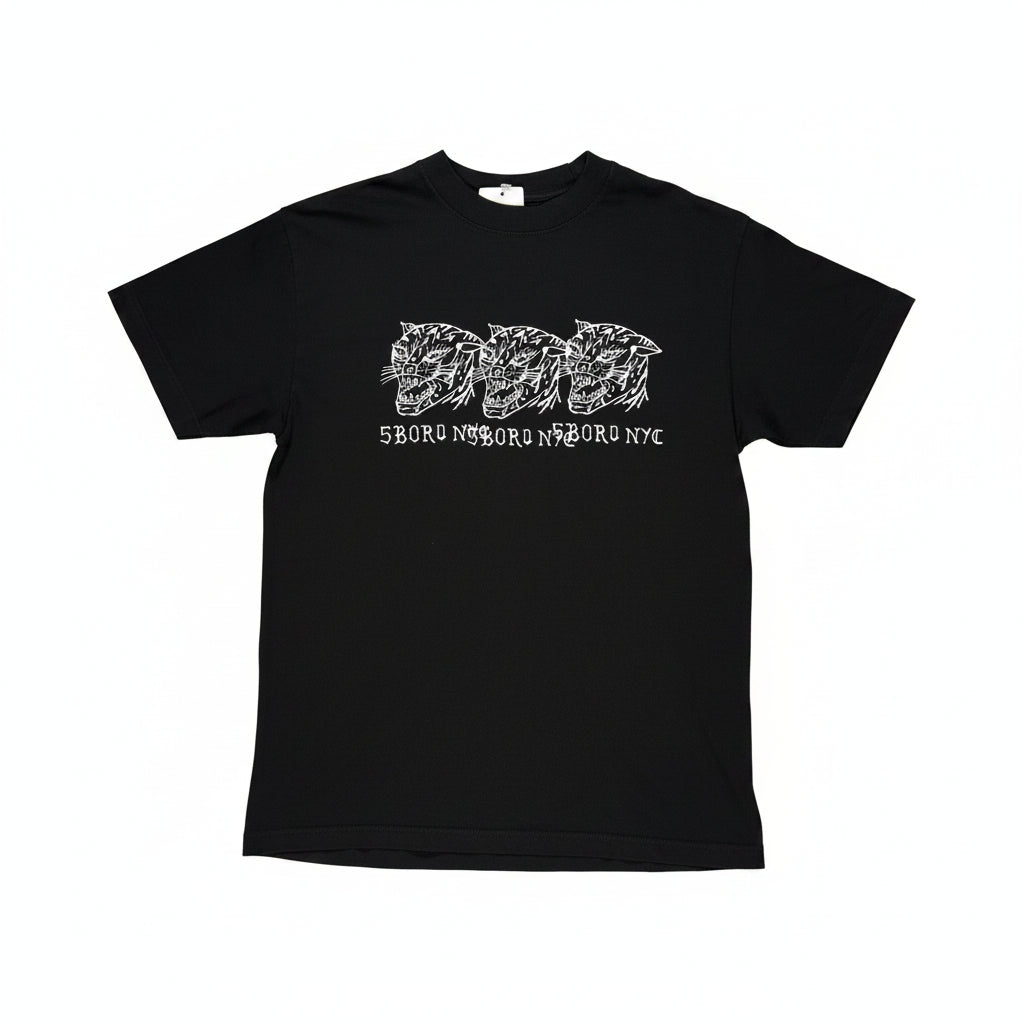 Black t-shirt with three hand drawn style cat logos in a row, on center chest of t-shirt. Tee on white background