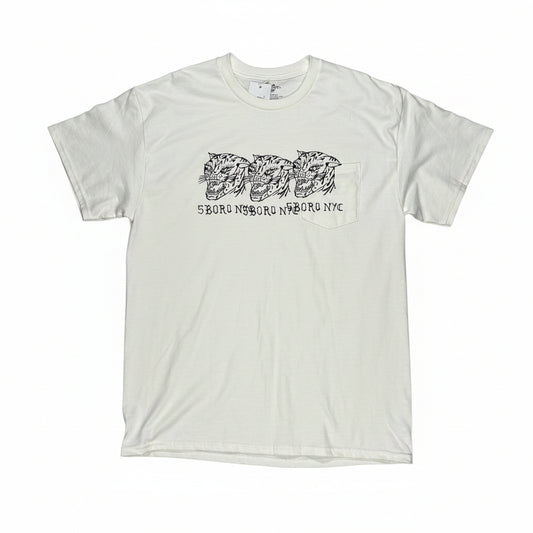 White pocket t-shirt with repeating black hand drawn style cat graphic design on a white surface