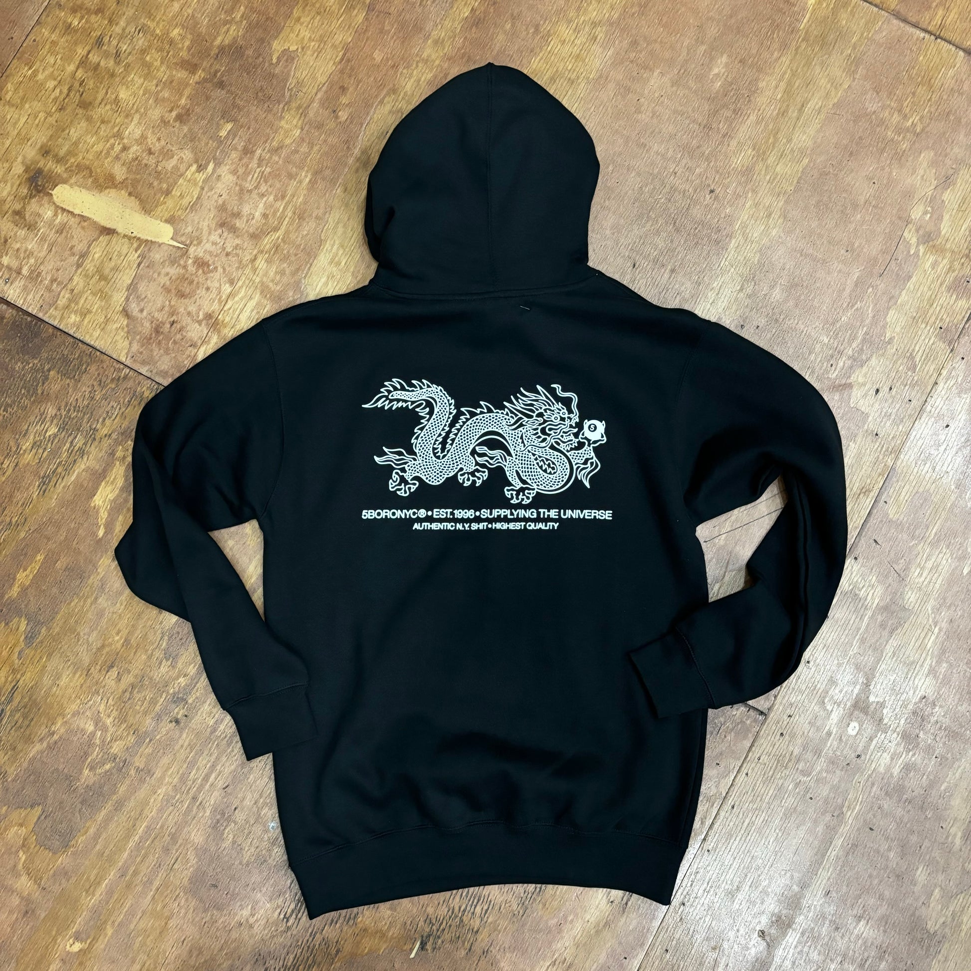 dragon on back of hoodie with type underneath that says 5boro nyc est 1996 supplying the universe, authentic NY shit, highest quality