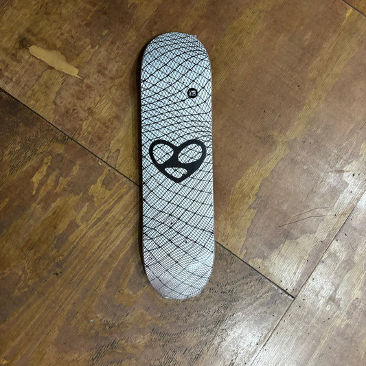 white and black abstract heart shape and wires on skateboard deck