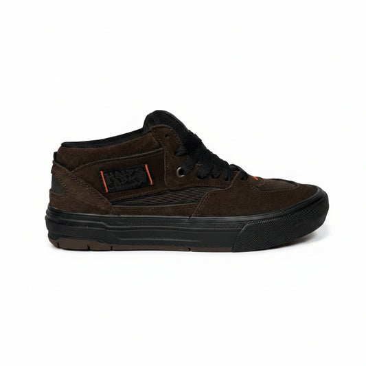 Brown sneaker on a textured surface