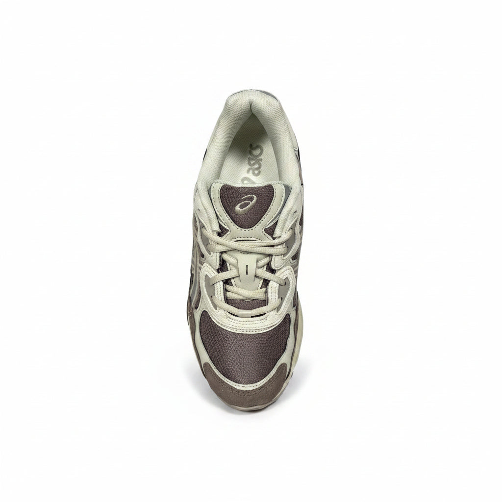 top down view of Sneaker with a brown and beige design on a white background