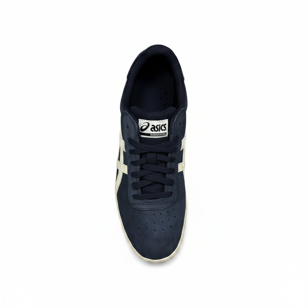 top down view of Navy sneaker with beige accents on a white background