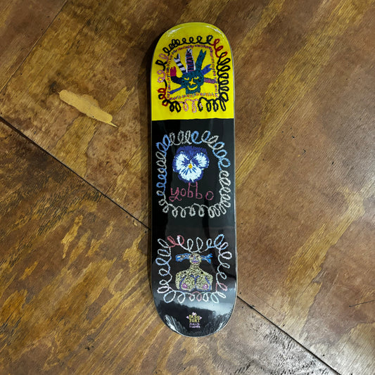 three hand drawn faces depicted vertically on skateboard deck