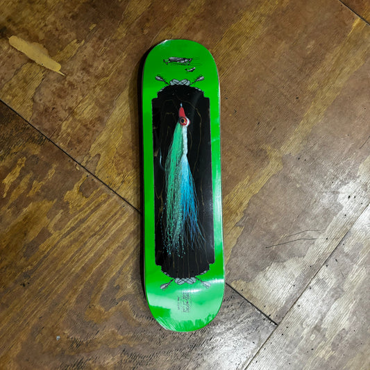 fly style fishing lure pictured on bottom of green and woodgrain skateboard deck