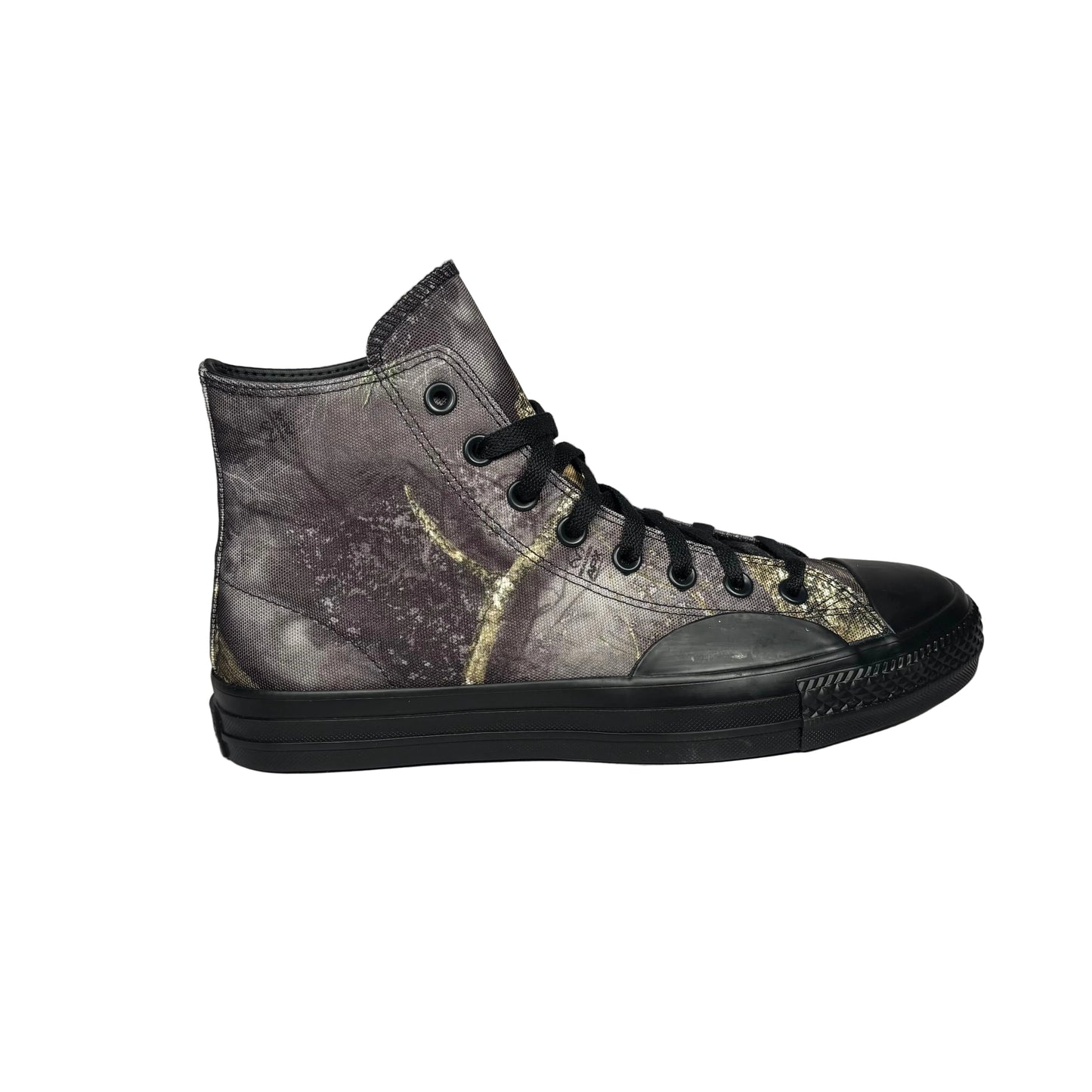 High-top sneaker with a realtree camo pattern on a white background