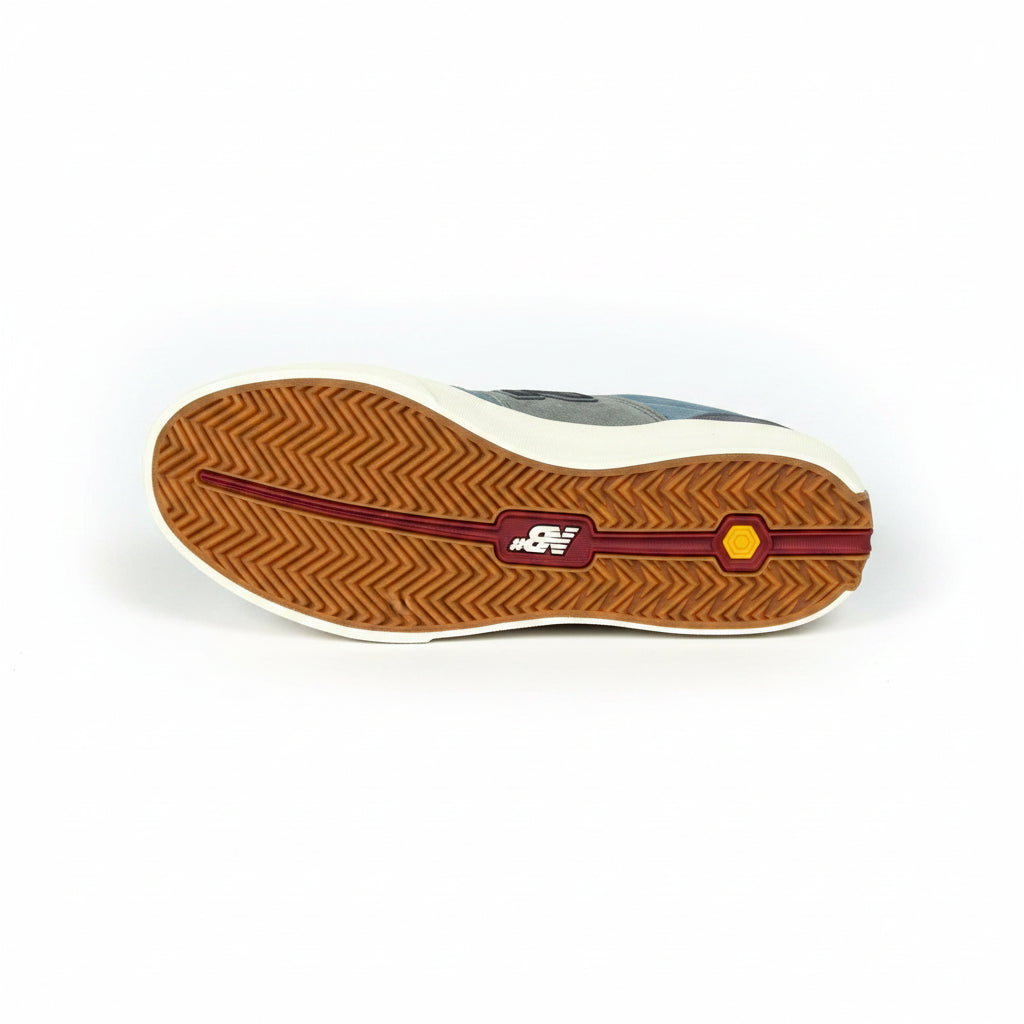 Sole of a shoe with brand logo on a white background