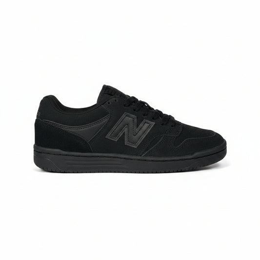Black sneaker with New Balance logo on a white background