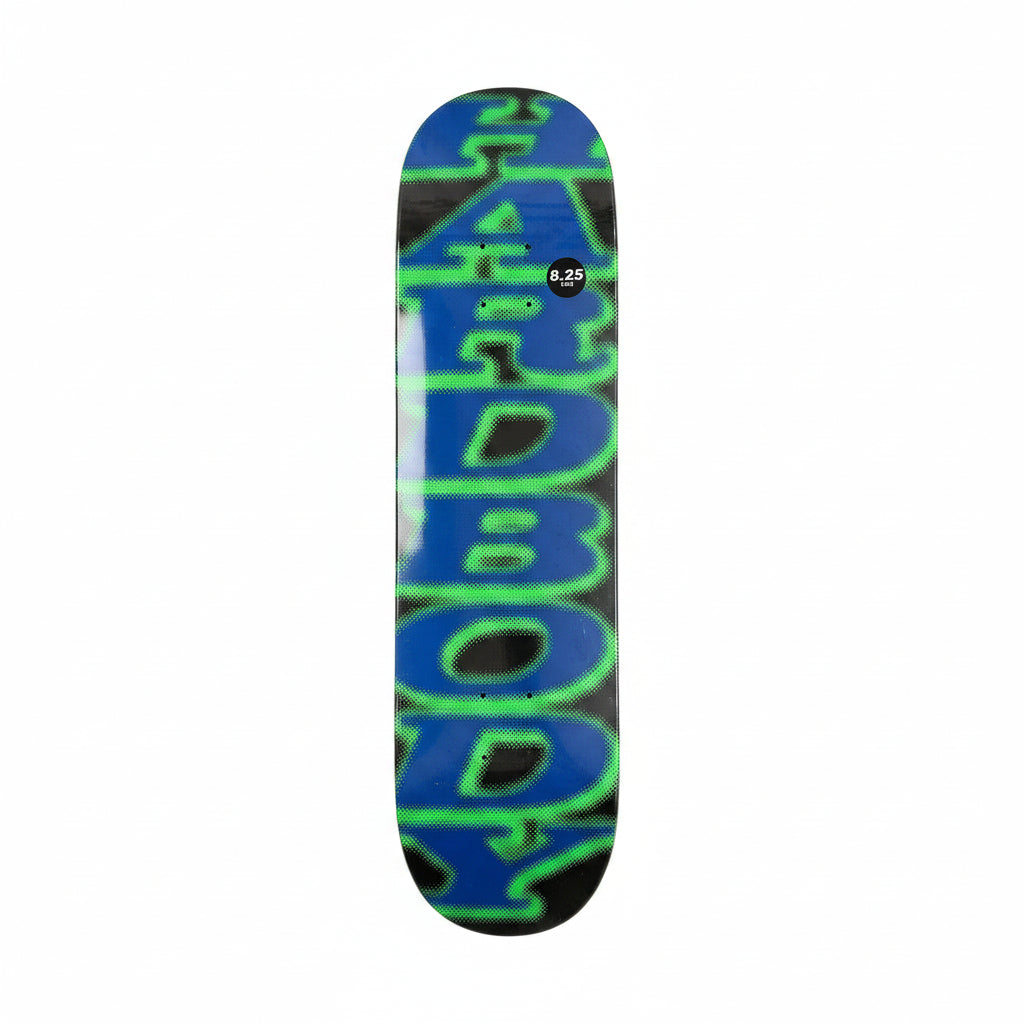 Skateboard deck with blue and green design on a white surface