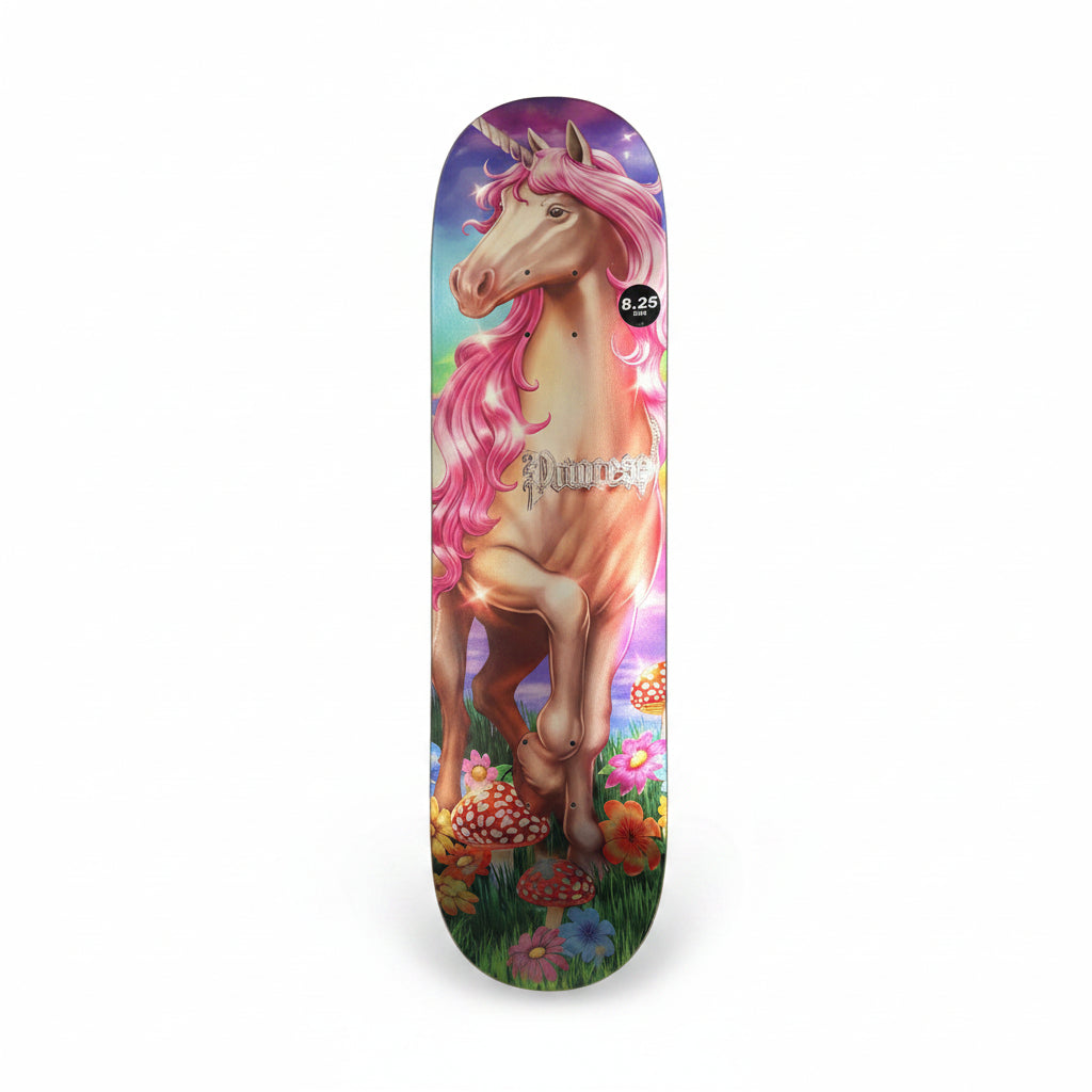 Skateboard deck with a metallic unicorn design on a white surface