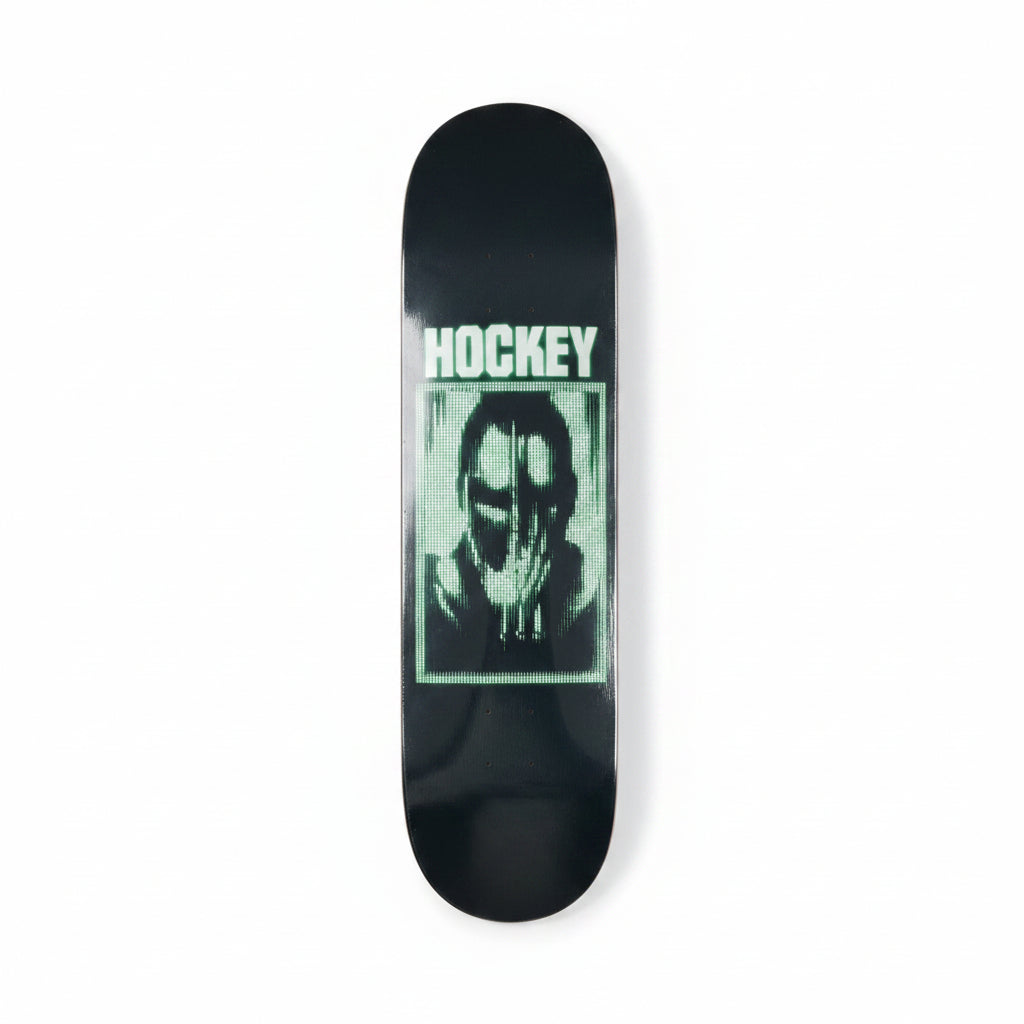 Skateboard deck with a graphic design on a white surface