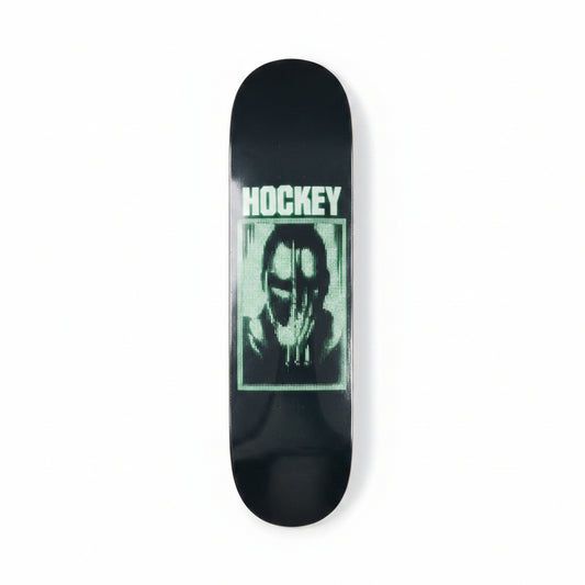 Skateboard deck with a graphic design on a white surface
