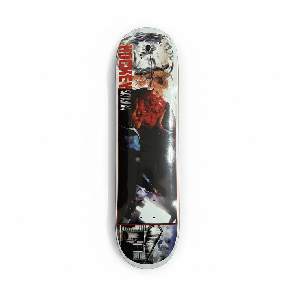 Skateboard deck with a graphic design on a white surface