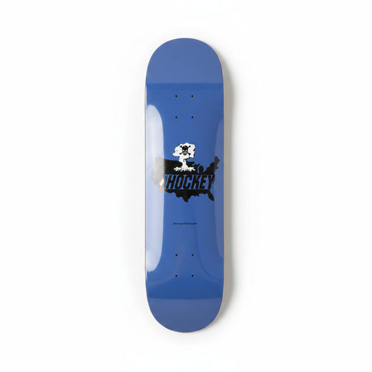 Blue skateboard deck with a logo on a white surface