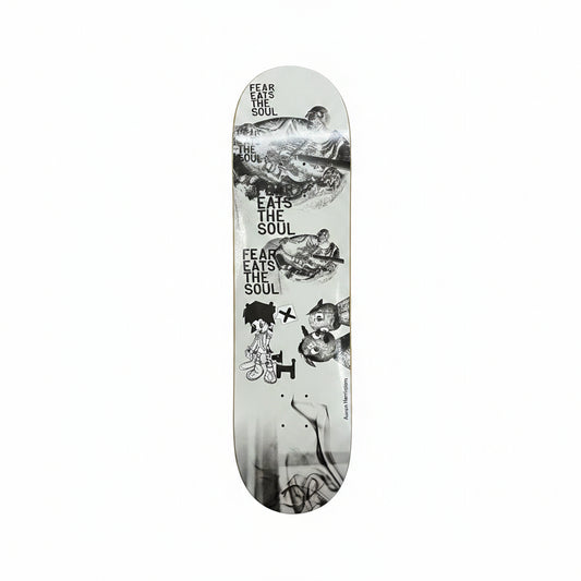 Skateboard deck with black and white graphics on a white background