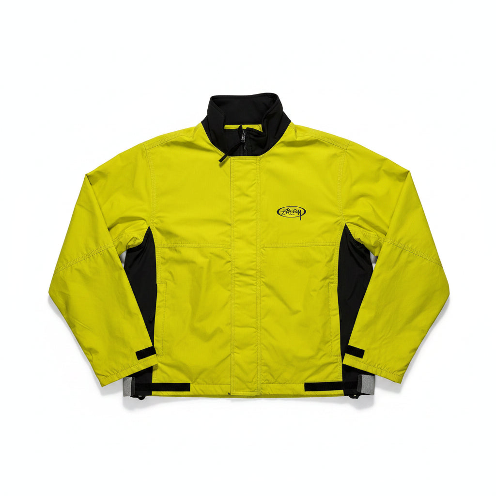 Yellow jacket with black accents on a white surface