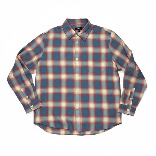 blue, red and white plaid shirt on a white surface 