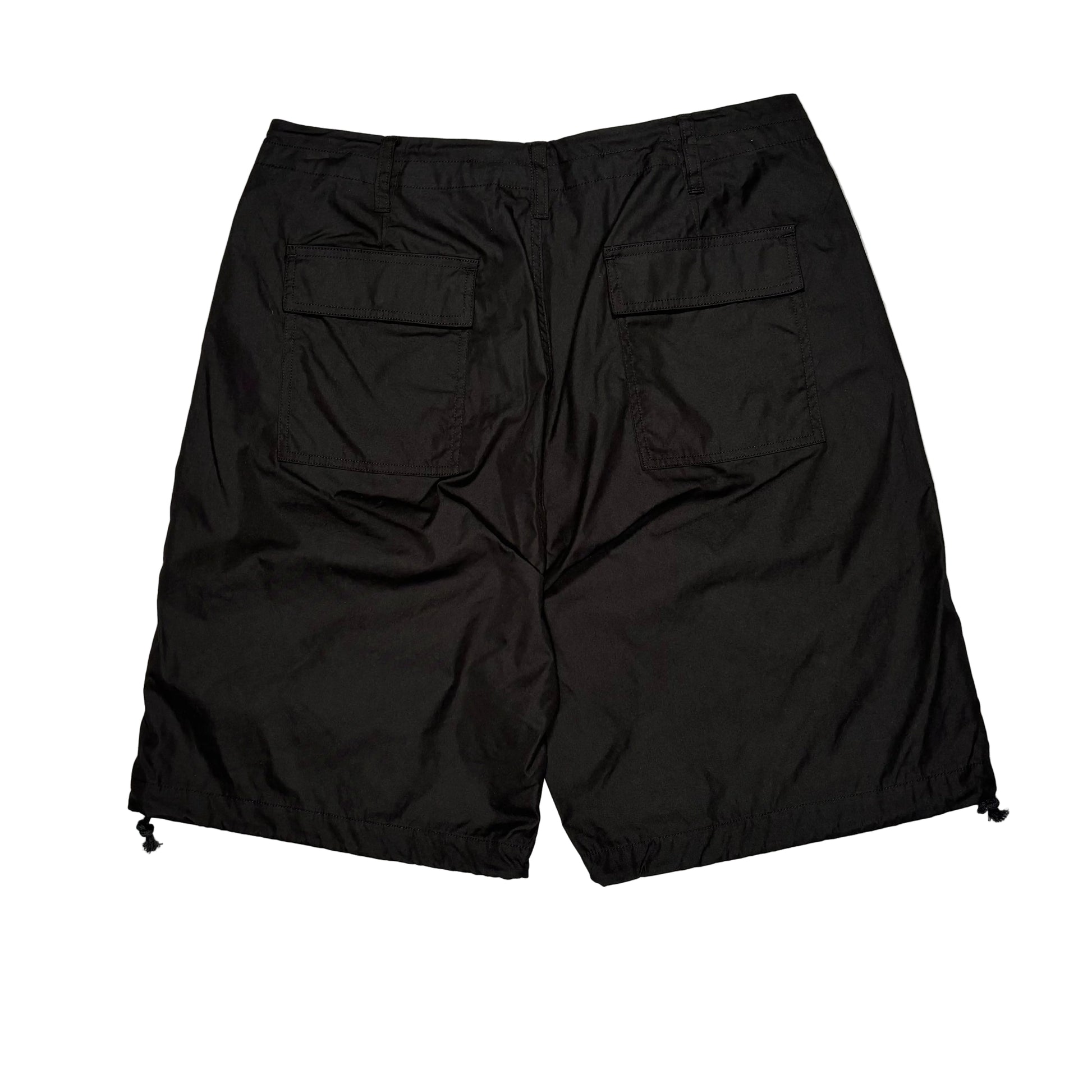 Black shorts on a white surface