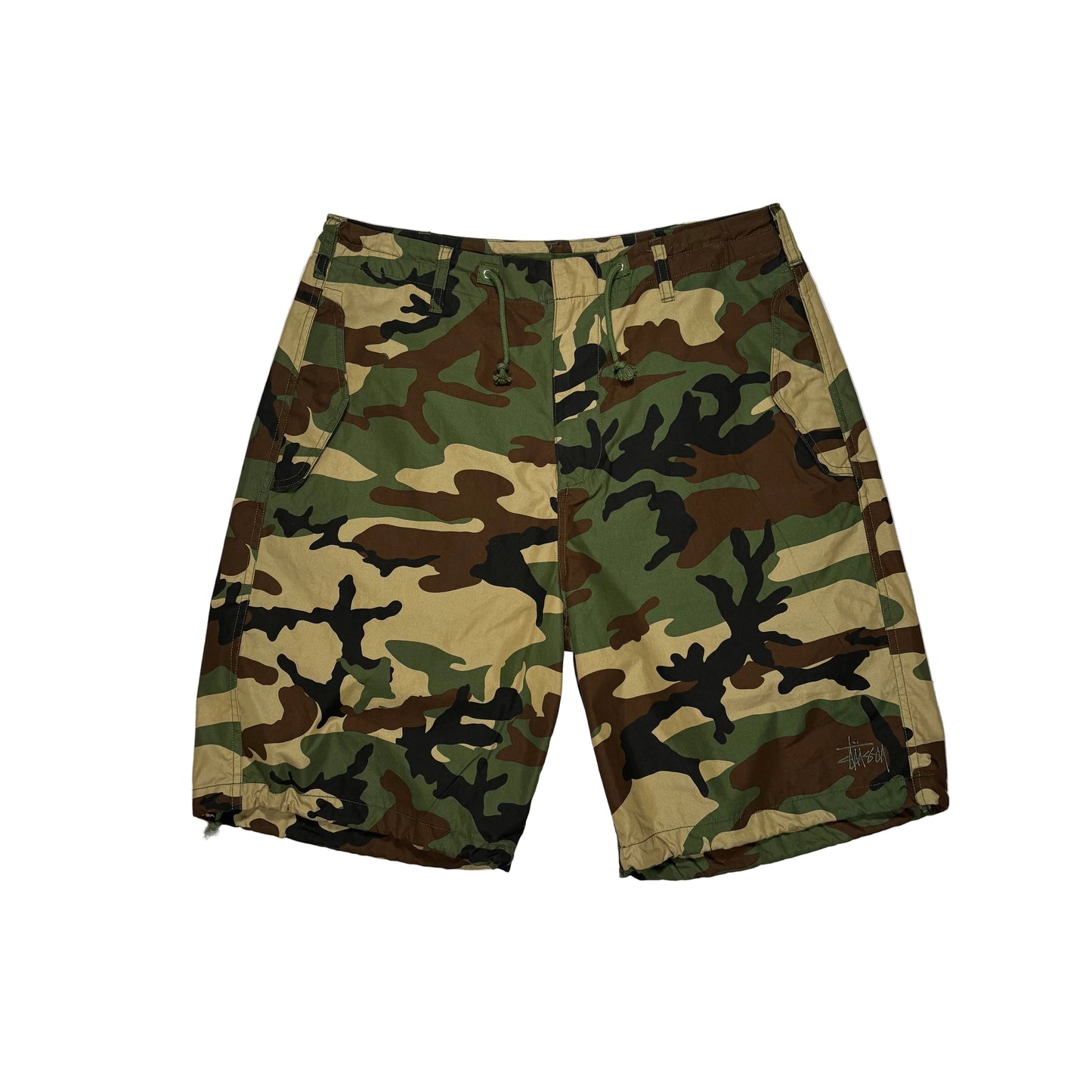 Camouflage shorts on a white surface
