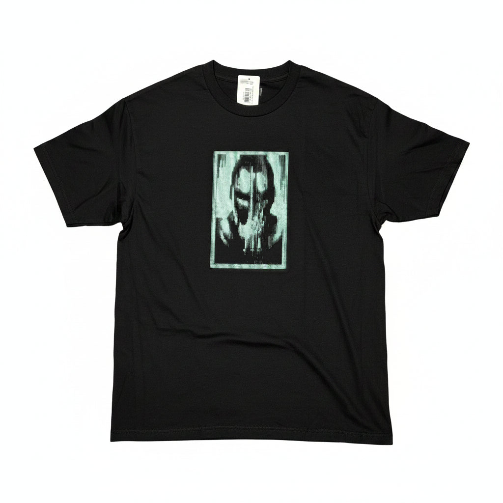 Black t-shirt with a graphic design on a white surface