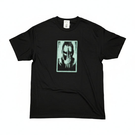 Black t-shirt with a graphic design on a white surface