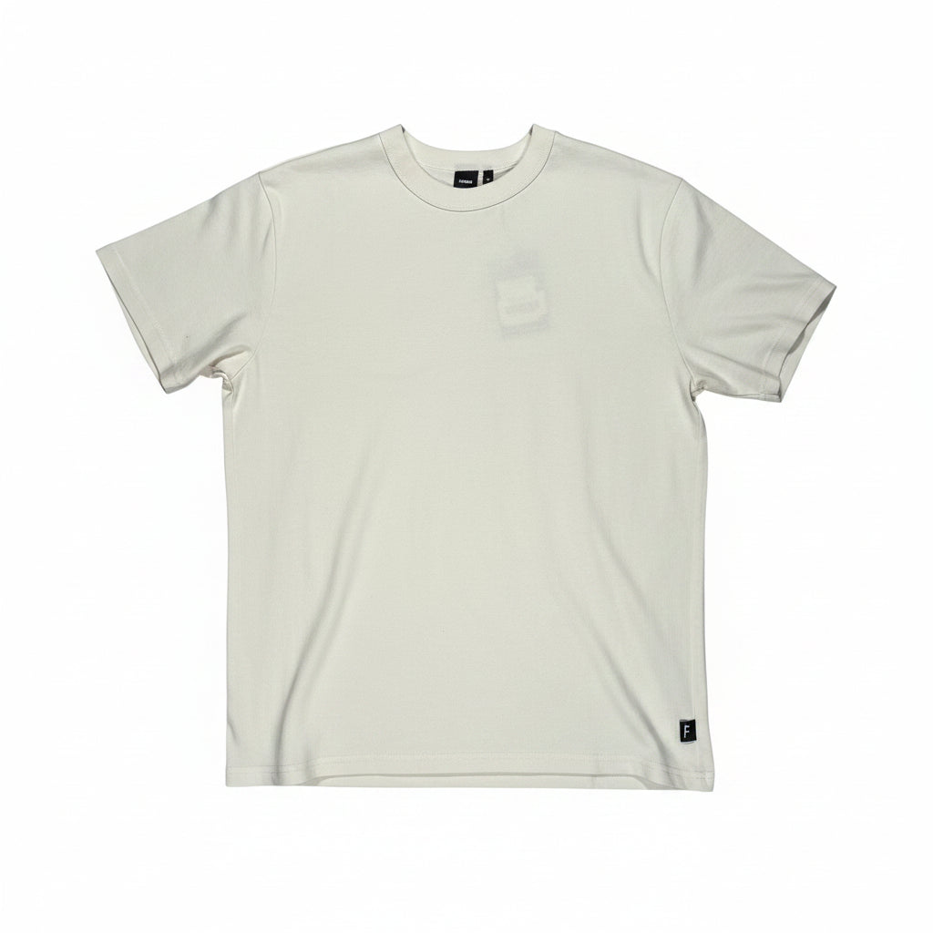 White t-shirt on a white surface