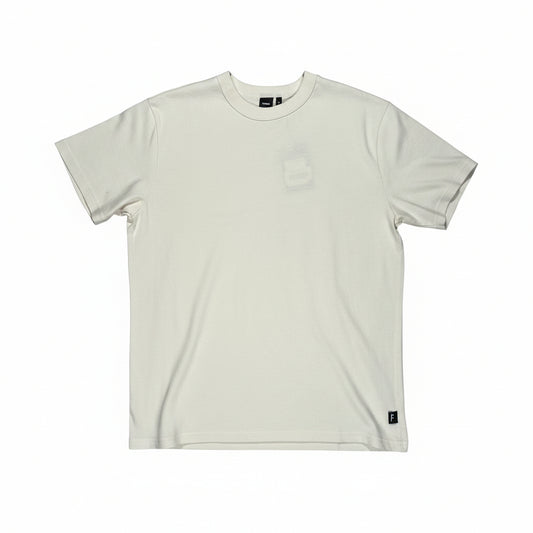 White t-shirt on a white surface
