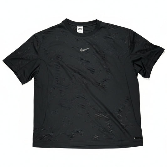 Black athletic looking jersey with a brand logo on a white surface