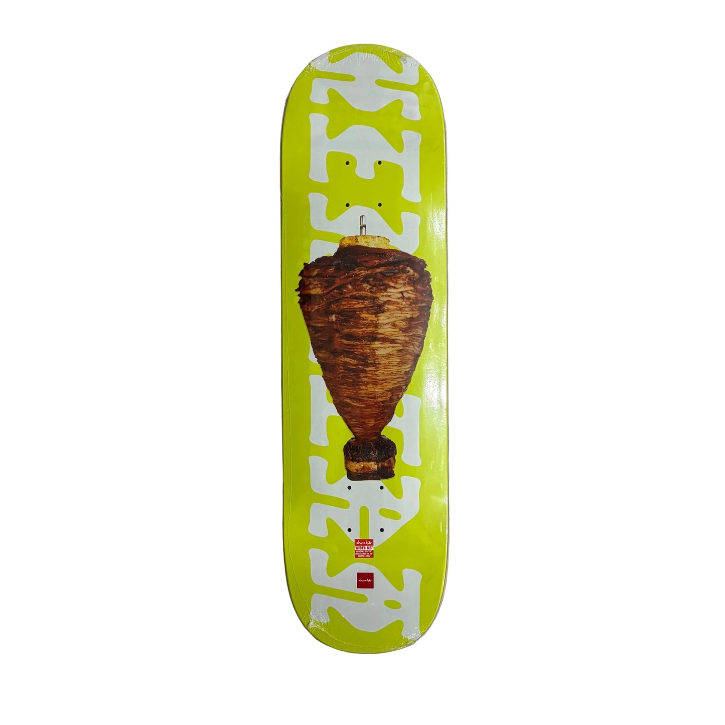Skateboard deck with a unique design on a white surface