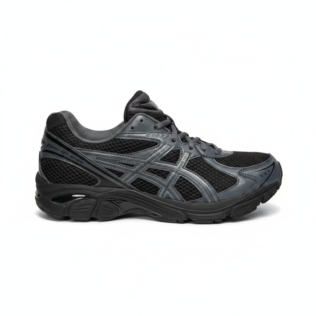 Black and gray athletic shoe on a white background