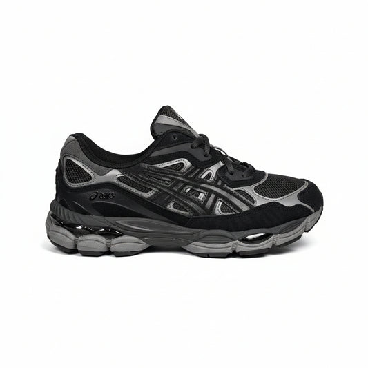 Black and gray running shoe on a white background
