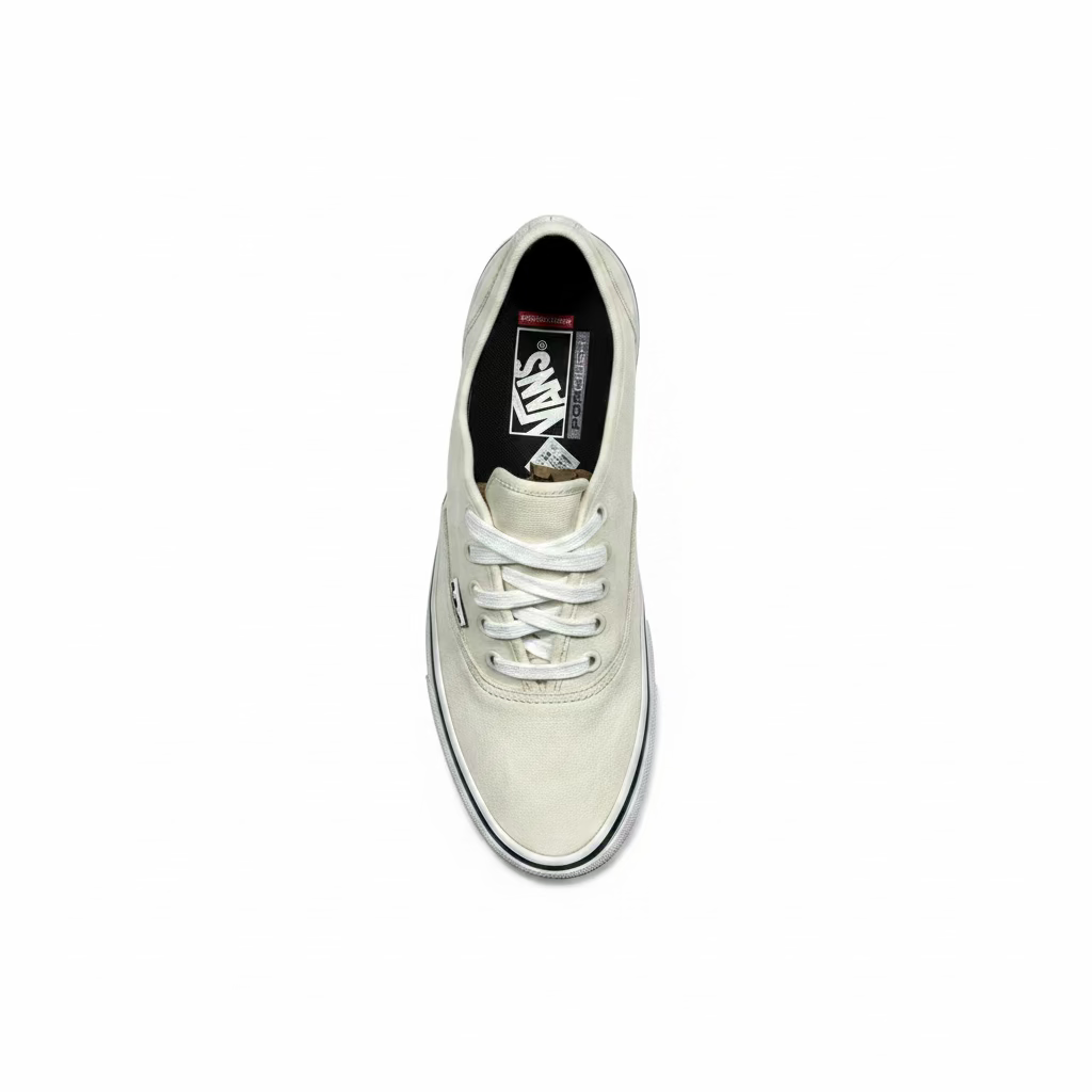 A single Vans authentic sneaker in off-white suede with white laces, shown from a top-down view on a white background.